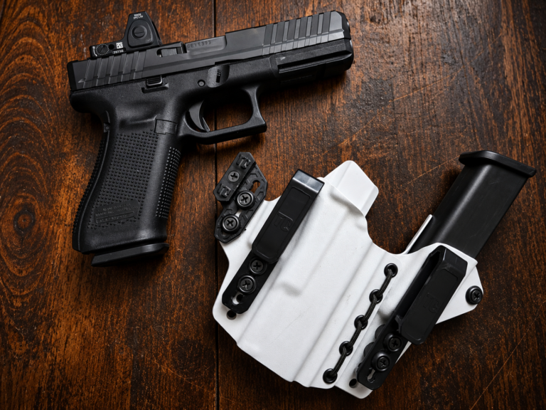 Tactical Glock and White Kydex Holster flat lay